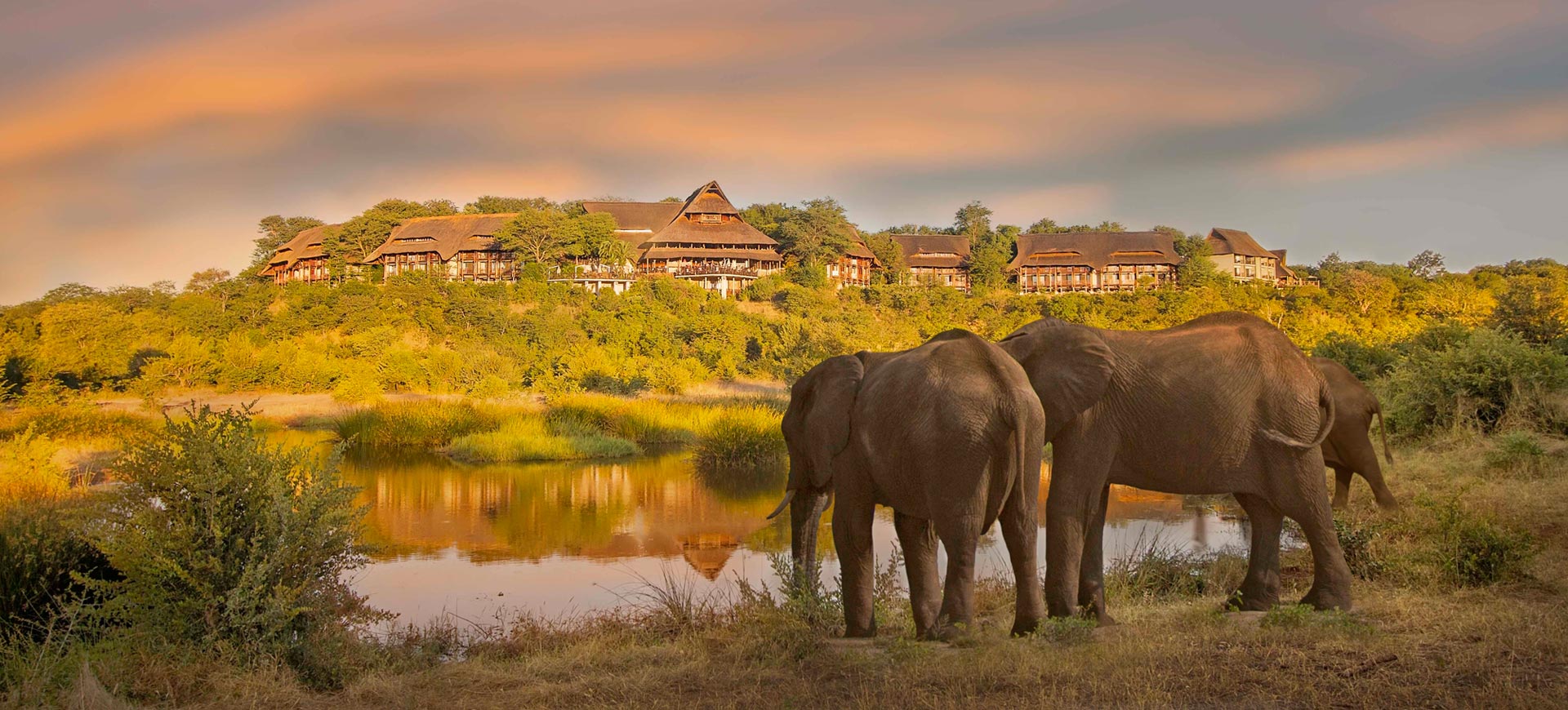 Victoria Falls hotel with views of Victoria Falls and lush Zambezi River surroundings